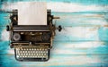 Vintage typewriter header with old paper. Royalty Free Stock Photo