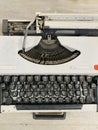 Vintage typewriter header with old paper. retro machine technology - top view and creative flat lay. Royalty Free Stock Photo