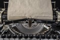 Vintage typewriter with an old blank sheet of paper mock up Royalty Free Stock Photo