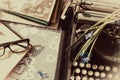 Vintage typewriter, old books on table Royalty Free Stock Photo