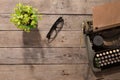 Vintage typewriter on the old wooden desk Royalty Free Stock Photo