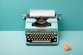 Vintage typewriter over blue background with copy space Royalty Free Stock Photo