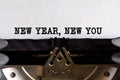 Vintage typewriter with printed text - NEW YEAR NEW YOU, on a sheet of paper Royalty Free Stock Photo