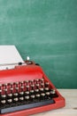 vintage typewriter on the table with blank paper - concept for writing, journalism, blogging Royalty Free Stock Photo