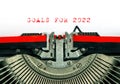 Vintage typewriter text GOALS FOR 2022 Red words paper background Royalty Free Stock Photo