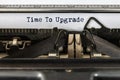 Vintage typewriter with text time to upgrade Royalty Free Stock Photo