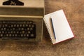 Vintage typewriter ,white  book, calculator ,pencil and candlelight on old wooden touch-up in still life concept Royalty Free Stock Photo