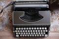 Vintage typewriter on the wood table with copy space