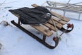 Vintage Ukrainian sled from iron and wood on the snow