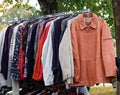 vintage used and more clothes for sale in the stall stand at the flea market Royalty Free Stock Photo