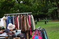 vintage used and new clothes for sale in the stall stand at the flea market Royalty Free Stock Photo