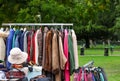 vintage used and new clothes for sale in the stall stand at the flea market Royalty Free Stock Photo