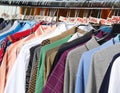 vintage used and new clothes for sale in the stall stand at flea market Royalty Free Stock Photo