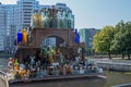 Vintage vessels in shades of blue, green and brown on wooden street vendor rack near by Honey bridge over Pregolya river.