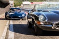 Vintage veteran car Jaguar E-Type competition roadster stands on race track Royalty Free Stock Photo