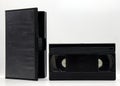 Vintage VHS video tape cassette with plastic cassette box. Retro style technology from the 90s Royalty Free Stock Photo