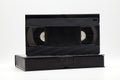 Vintage VHS video tape cassette with plastic cassette box. Retro style technology from the 90s Royalty Free Stock Photo