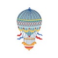 Vintage victorian vivid striped air hot balloon. Flying ornamented childish aerostat with flags, basket. Airship for t Royalty Free Stock Photo