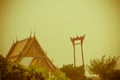 Vintage view of the Giant Swing, a religious structure which located in front of Wat Suthat temple. It was used in the Brahmin ce Royalty Free Stock Photo