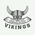 Vintage vikings logo, label, emblem, badge in retro style