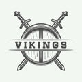 Vintage vikings motivational logo, label, emblem, badge