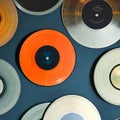 722 Vintage Vinyl Records: A retro and nostalgic background featuring vintage vinyl records in faded and retro colors that evoke Royalty Free Stock Photo