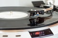 Vintage vinyl turntable in action closeup Royalty Free Stock Photo