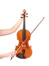 Vintage violin and fiddle stick in woman hands Royalty Free Stock Photo