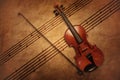 Vintage violin on the sheet music. Royalty Free Stock Photo