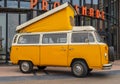 Vintage Volkswagen camper van from 1976 in orange colour at The Aircooled classic car show