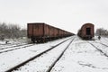 Old wagons on the railway in the snow in winter. Royalty Free Stock Photo