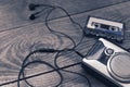 Vintage walkman cassette player with earbuds and tape cassette Royalty Free Stock Photo