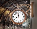 Vintage wall clock on the train station. 3D illustration