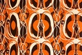 Vintage wallpaper with a bold orange and brown abstract pattern inspired by 60s mod fashion Royalty Free Stock Photo