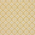 Vintage wallpaper texture with a yellow and green diamond shaped floral pattern Royalty Free Stock Photo
