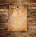 Vintage wanted poster on a wooden Royalty Free Stock Photo