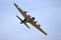 Vintage warbird US Air Force Boeing B-17 Flying Fortress WW2 bomber plane perforing at the Sanice Sunset Airshow. Belgium - Royalty Free Stock Photo