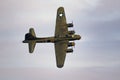 Vintage warbird US Air Force Boeing B-17 Flying Fortress WW2 bomber plane perforing at the Sanice Sunset Airshow. Belgium - Royalty Free Stock Photo