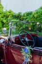 Vintage Wedding Car Decorated with Flowers Royalty Free Stock Photo