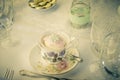 A vintage wedding cup cake in teacup Royalty Free Stock Photo