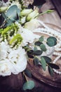 Vintage wedding decor, bouquet of white flowers and candles Royalty Free Stock Photo