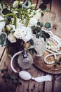 Vintage wedding decor, perfume and pearl beads, flower bouquet Royalty Free Stock Photo