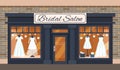 Vintage wedding shop store facade with large window, columns