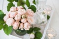 Vintage wedding table decorations with roses, candles cutlery Royalty Free Stock Photo