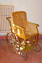 The vintage wheel chair in Van Gogh`s museum in Saint-Paul Asylum, on May 6, 2013 in Saint-Remy-de-Provence, France