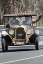 Vintage 1929 Whippet 96A Tourer driving on country road