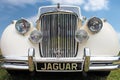 Vintage white car Jaguar close up.