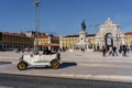 Vintage White Car Parked by Praca Do Comercio on a Sunny Day in Lisbon, Portugal