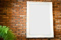 Vintage white frames on brick wall. Royalty Free Stock Photo