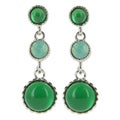 Vintage white gold earrings with green gemstone Royalty Free Stock Photo